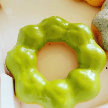 Le Creme - Close up shot of matcha mochi donut - Desserts Near Me - San Jose, California