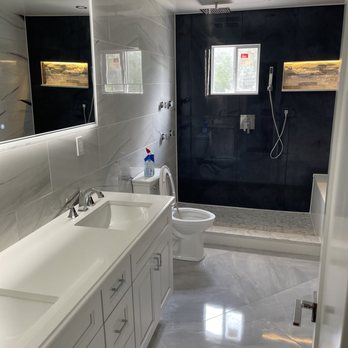 VS Contracting - a modern bathroom with a walk in shower - Heating & Air Conditioning/HVAC Near Me - Monroe, New York VS Contracting - a modern bathroom with a walk in shower - Heating & Air Conditioning/HVAC Near Me - Monroe, New York