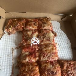 Giorgio's Pizza & Subs - Sicilian pie half sausage, half plain well done