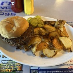 Tosi Diner - Half pound burger with fried potatoes and onions. Delish!