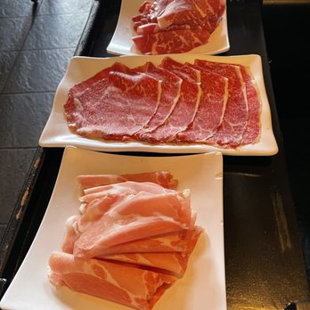 Boiling Hot Pot - Top: Thin Sliced Premium Beef Middle: Thin Sliced Beef Wagyu Bottom: Thin Sliced Pork Belly - Hot Pot Near Me - San Francisco, California Boiling Hot Pot - Top: Thin Sliced Premium Beef Middle: Thin Sliced Beef Wagyu Bottom: Thin Sliced Pork Belly - Hot Pot Near Me - San Francisco, California