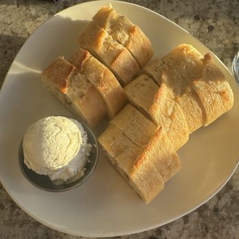 Longhi's - French bread w/ black lava salt honey butter - Seafood Near Me - Kapolei, Hawaii Longhi's - French bread w/ black lava salt honey butter - Seafood Near Me - Kapolei, Hawaii