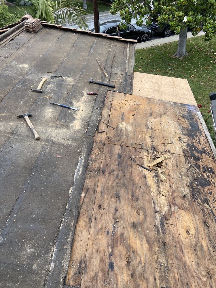 Slide of Mencho's Roofing & Repairs