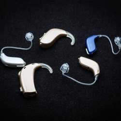 Comprehensive Hearing - Hearing Aids of all colors and sizes!