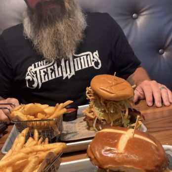 Guy Fieri's Branson Kitchen + Bar - Motley Que Pulled Pork and Mac n cheese bacon burger. - Bars Near Me - Branson, Missouri Guy Fieri's Branson Kitchen + Bar - Motley Que Pulled Pork and Mac n cheese bacon burger. - Bars Near Me - Branson, Missouri