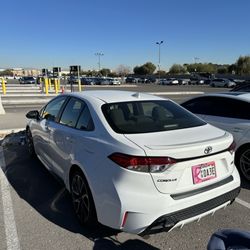 Flexx Prestige Rentals - Parked at the remote parking lot at rental car return near airport.