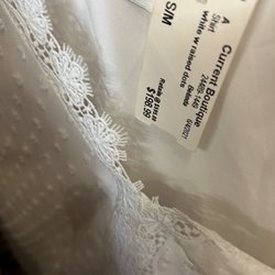 Current Boutique - A slightly dirty and used condition 8 year old shirt for almost 200 bucks, what a deal.