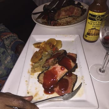 Chadwick's - What's left of 24ounce aged porter house steak for two with potatoes and spinach... Great !!!!! - American Near Me - Brooklyn, New York