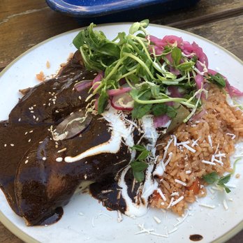 NIDO's BackYard - Enchilada de Pato con Mole Muasteco - Mexican Near Me - Oakland, California NIDO's BackYard - Enchilada de Pato con Mole Muasteco - Mexican Near Me - Oakland, California