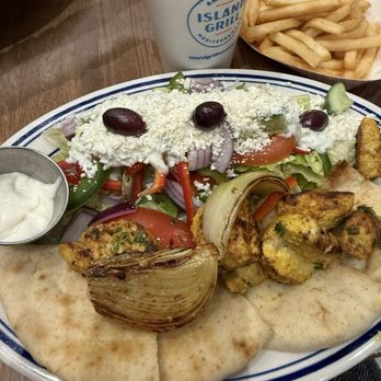 Island Grill - Grilled chicken with pita bread and Greek salad - Mediterranean Near Me - Houston, Texas Island Grill - Grilled chicken with pita bread and Greek salad - Mediterranean Near Me - Houston, Texas