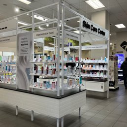 a pharmacy counter with a variety of products a pharmacy counter with a variety of products
