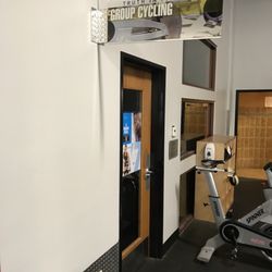 Group cycle studio by the men's locker room.