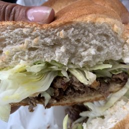 Bifstec encebollao" ( steak sandwich w/ onions) Bifstec encebollao" ( steak sandwich w/ onions)