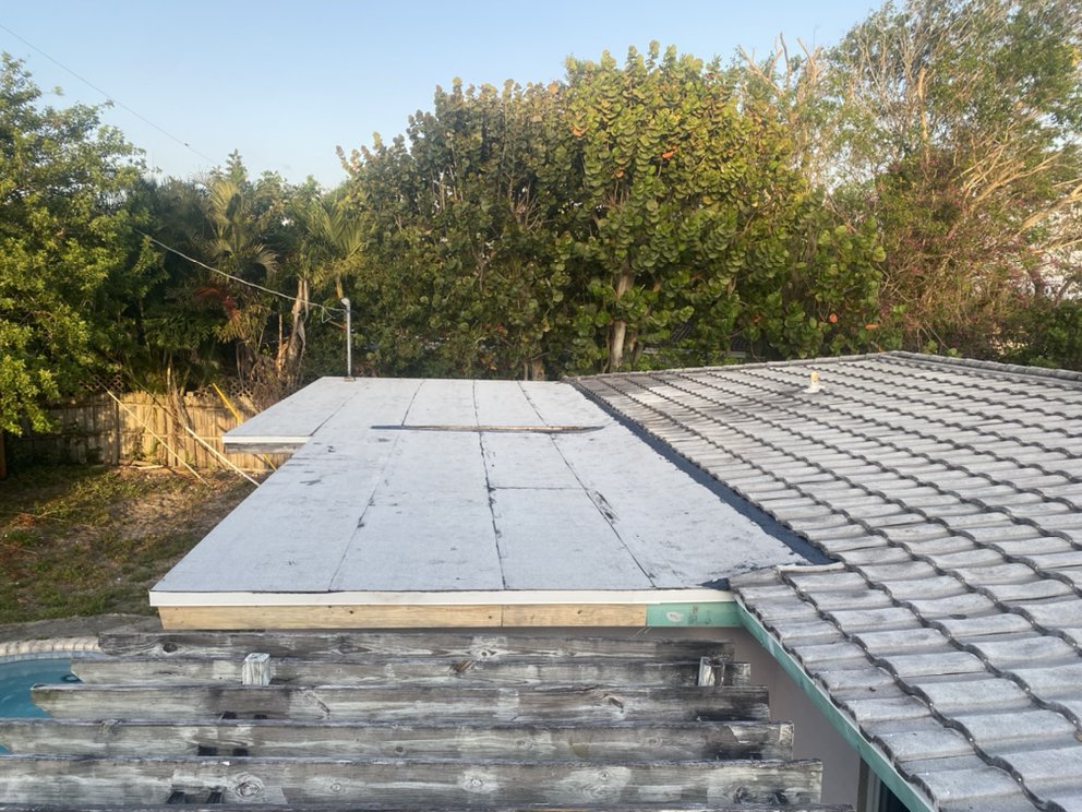 Slide of Tropical Roofing Services