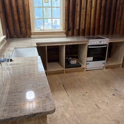 Stone Gallery of The Lakes - Our small century-old log cabin kitchen rebuild with countertops installed yesterday. Nothing is square, plumb or regular but it's perfect.