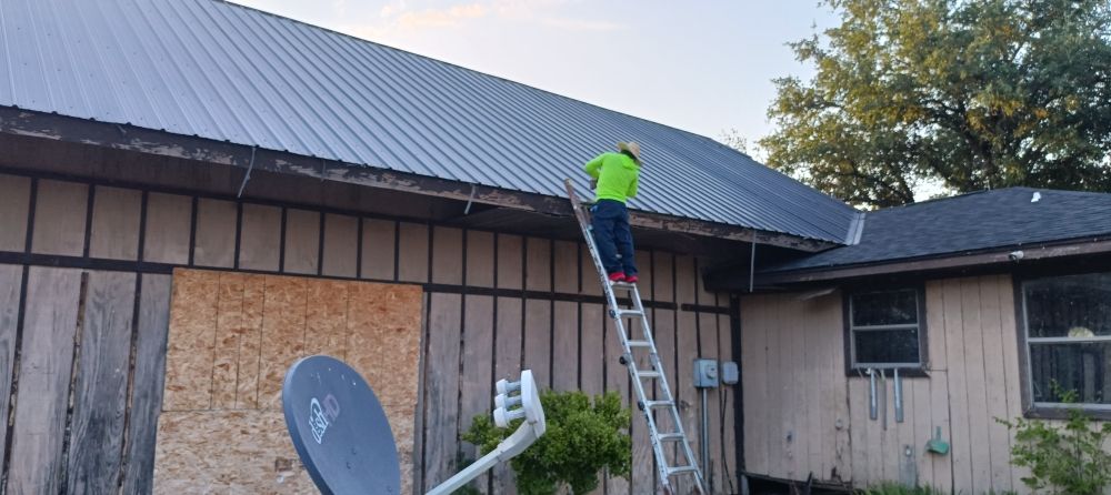 Slide of Cisneros Roofing