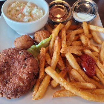 Stripers Waterside - Fried crab cake basket with fries, hush puppies, and slaw. $26 lunch - Seafood Near Me - Norfolk, Virginia Stripers Waterside - Fried crab cake basket with fries, hush puppies, and slaw. $26 lunch - Seafood Near Me - Norfolk, Virginia