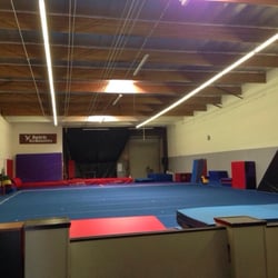 Spirit Gymnastics - Gym 1 tumbling gym. Full cheer size competition floor, tumble trak and various mats/blocks