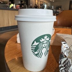Starbucks - A tall hot Cafe Latte