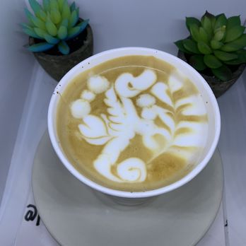 Frisson Espresso - Sea horse on latte - Coffee & Tea Near Me - New York, New York Frisson Espresso - Sea horse on latte - Coffee & Tea Near Me - New York, New York