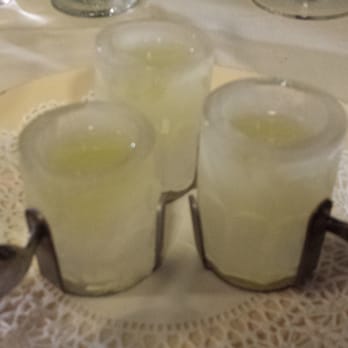 Silver Spoon - Limoncello in ice shot glasses and silver spoon handles. - Italian Near Me - Rochester, Michigan
