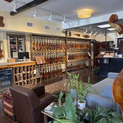 Violin Shop - Tampa - Inside the store, violin wall.