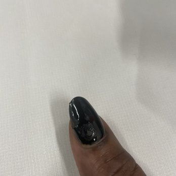 22 Shades - Again bad job  shellac started coming off Plus she put pressed on nails on my fingers never ask me or anything.  It's a rip off . - Nail Salons Near Me - Lynnwood, Washington
