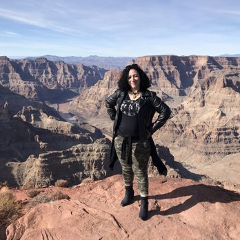 Grand Adventures Tours - Standing on the west rim of the Grand Canyon - Walking Tours Near Me - Las Vegas, Nevada