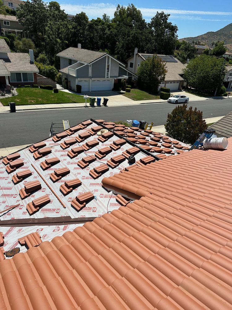 Slide of Scorpion Roofing