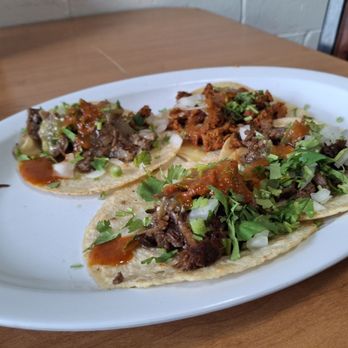 Taqueria Los Amigos - My four tacos with the red and green sauce added - Mexican Near Me - Orlando, Florida Taqueria Los Amigos - My four tacos with the red and green sauce added - Mexican Near Me - Orlando, Florida