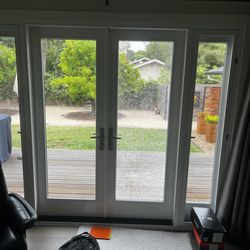 Anaheim Glass - Shattered glass on patio door.