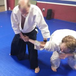 Academy of Martial Arts & Personal Development - Sensei Sheahan (age 77) using Aikido techniques to immobilize an opponent.
