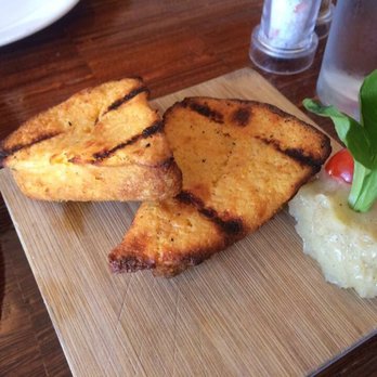 Grace's Table - Iron Skillet corn bread with lavander and honey butter - New American Near Me - Napa, California Grace's Table - Iron Skillet corn bread with lavander and honey butter - New American Near Me - Napa, California