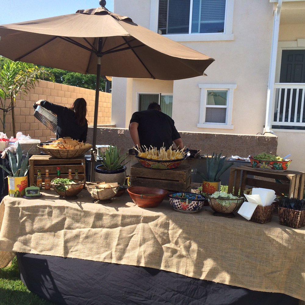 Taco Chop - Danny and his wife in action. - Caterers Near Me