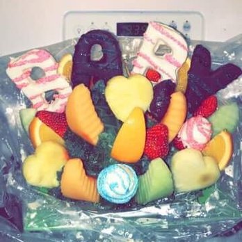 Kingman Fruit Creations - a fruit arrangement in plastic wrap - Desserts Near Me - Kingman, Arizona