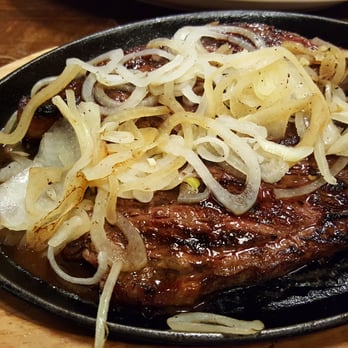 Brazilian Steak House - Picanha steak with garlic and onions - Brazilian Near Me - Sarasota, Florida