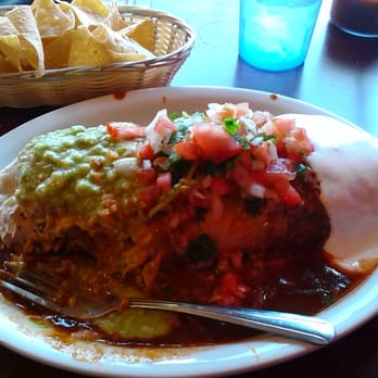 El Taconazo - !WET... !VEGGIE.... !BURRITO...
'rice, lettuce, picco de gio, whole beans, light cheese, sour cream, guacamole, red sauce'. - Mexican Near Me - Daly City, California