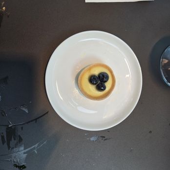 Delta One Lounge - A fruit tart, reminiscent in flavor of a creme brule, without the crunchy top - Airport Lounges Near Me - Queens, New York