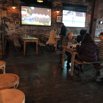 Hudson Hall - Two big projection TVs - Beer Bar Near Me - Jersey City, New Jersey Hudson Hall - Two big projection TVs - Beer Bar Near Me - Jersey City, New Jersey