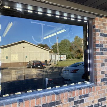 JJ’S Pizza - the reflection of a car in a window - Pizza Near Me - Lewisport, Kentucky
