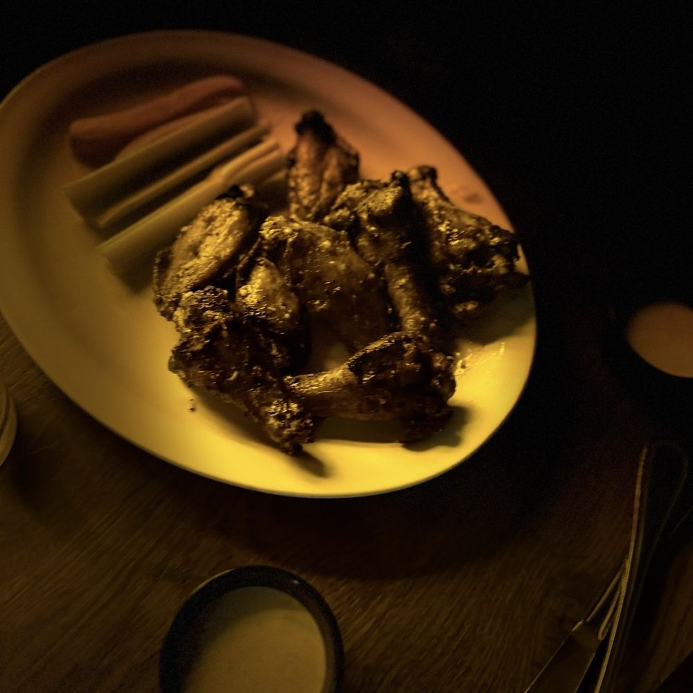 Gilley's - Chicken wings with veggies - Bars Near Me - Durant, Oklahoma