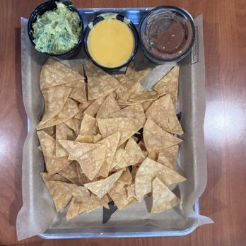 La Dosis Coffee + Cocktails - Chip sampler with guacamole, melted cheese and salsa picante. - Coffee & Tea Near Me - Cedar Park, Texas La Dosis Coffee + Cocktails - Chip sampler with guacamole, melted cheese and salsa picante. - Coffee & Tea Near Me - Cedar Park, Texas