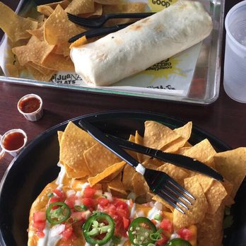 Tijuana Flats - Wet blackened chicken chimichanga and blackened chicken burrito - Mexican Near Me - Jacksonville, Florida Tijuana Flats - Wet blackened chicken chimichanga and blackened chicken burrito - Mexican Near Me - Jacksonville, Florida