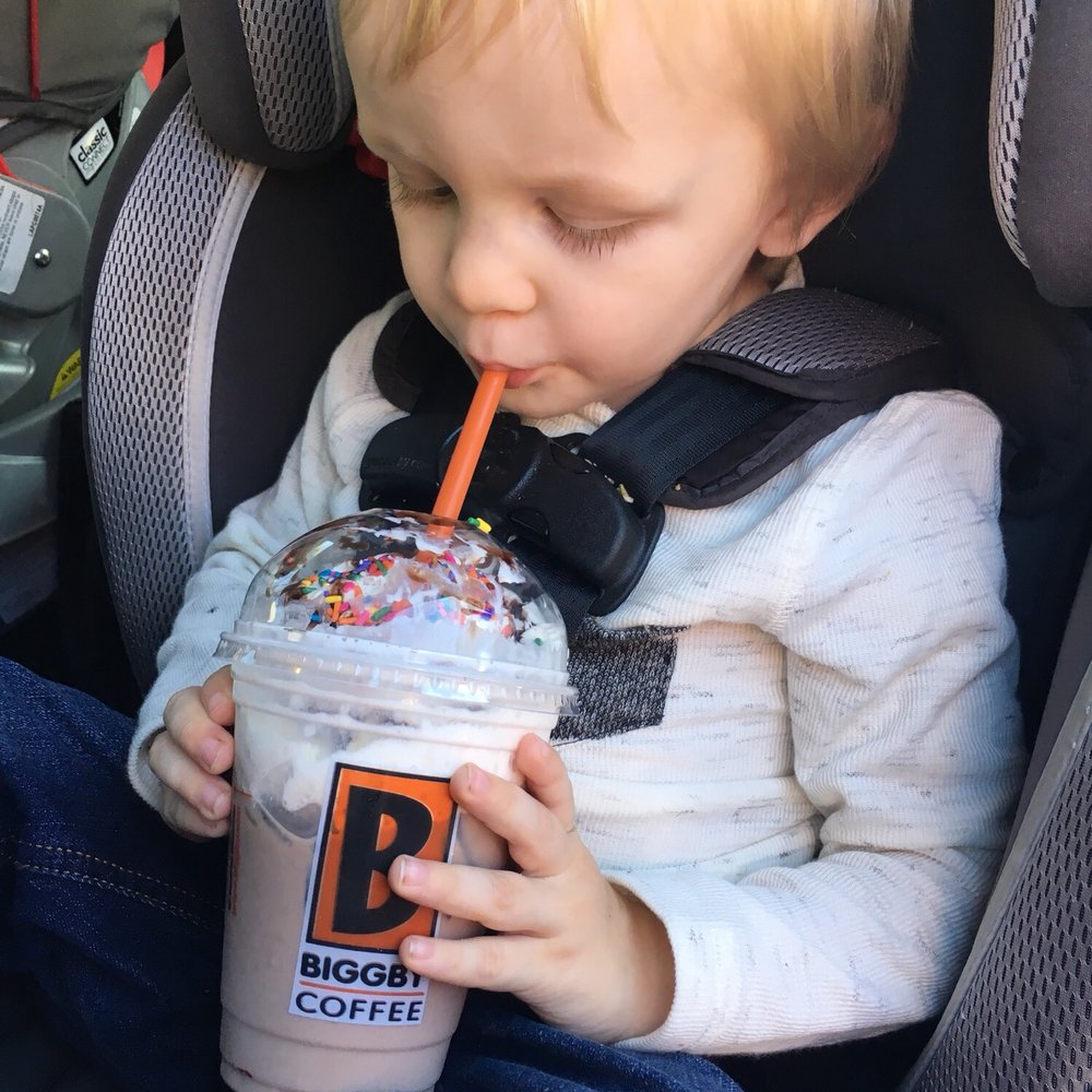 BIGGBY COFFEE - a toddler drinking a drink - Coffee & Tea Near Me - Houghton, Michigan