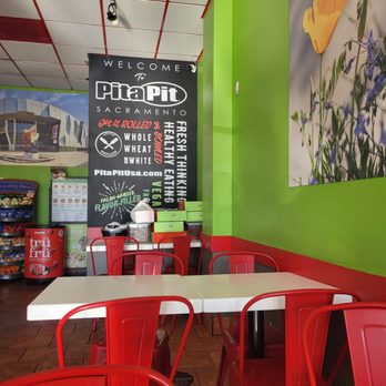Pita Pit - tables and chairs in a restaurant - Mediterranean Near Me - Sacramento, California Pita Pit - tables and chairs in a restaurant - Mediterranean Near Me - Sacramento, California