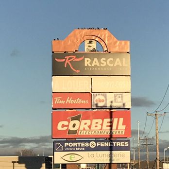 Rascal - a large sign in a parking lot - Barbeque Near Me - Quebec City, Quebec