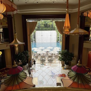 Overlook Lounge, Aperitifs & Spirits - View from inside, looking out onto the intimate outdoor patio - Lounges Near Me - Las Vegas, Nevada Overlook Lounge, Aperitifs & Spirits - View from inside, looking out onto the intimate outdoor patio - Lounges Near Me - Las Vegas, Nevada