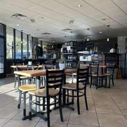 Front entrance main dining area where I was seated there's lounging sofas Front entrance main dining area where I was seated there's lounging sofas