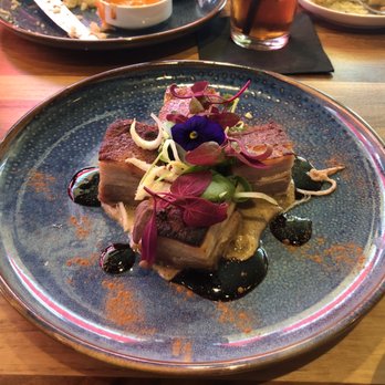 Crave Kitchen & Bar - 2nd order of pork belly with huckleberry drizzle. I didn't share this one! - Bars Near Me - Eagle, Idaho