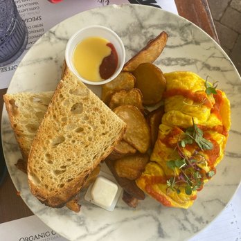 Cafe on 27 - Pork sausage with scrambled eggs, potatoes and sourdough bread. - Breakfast & Brunch Near Me - Topanga, California Cafe on 27 - Pork sausage with scrambled eggs, potatoes and sourdough bread. - Breakfast & Brunch Near Me - Topanga, California